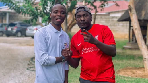 Muzo AKA Alphonso with Philanthropist Remmy Kangwa