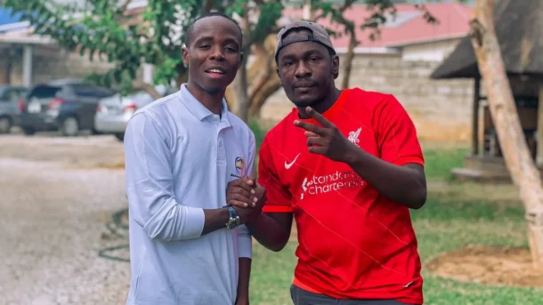 Muzo AKA Alphonso with Philanthropist Remmy Kangwa